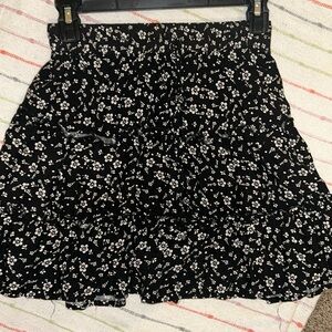 Rue21 small ruffled skirt, black with white flower details